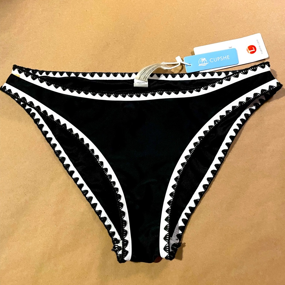 Black and white bathing suit bottoms. Never been wore with tags